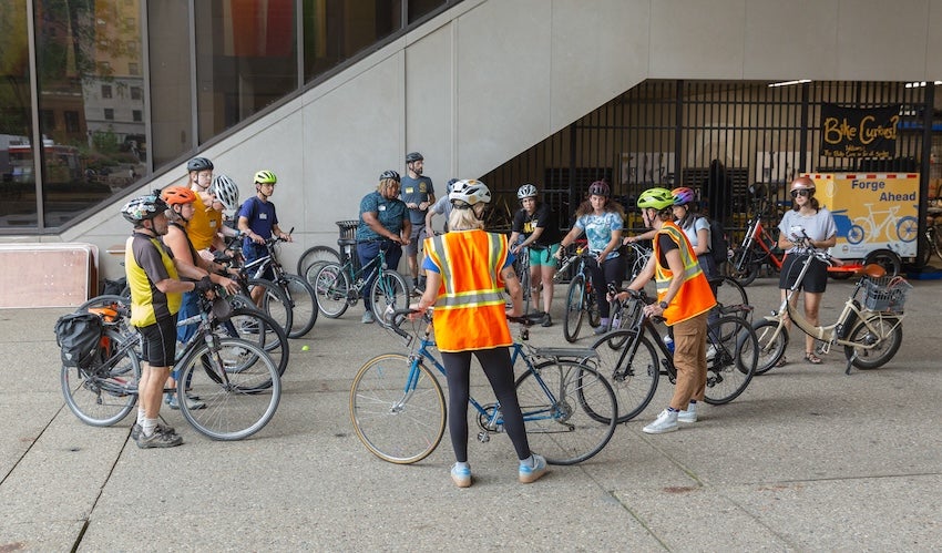 Cyclists attending a biking safety course at the Bike Cave. 