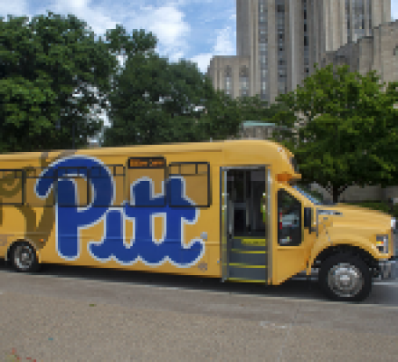 Pitt Shuttle parked outside the Cathedral of Learning